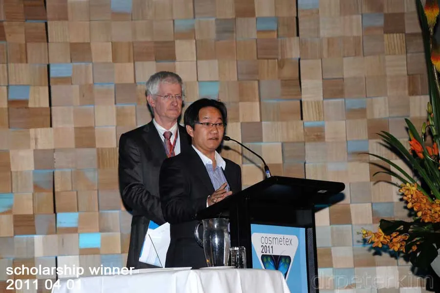 Dr Peter Kim receiving a research scholarship